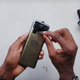 Imagen para el artículo titulado El teléfono del hermano de Pablo Escobar es un Galaxy Fold con una pegatina dorada